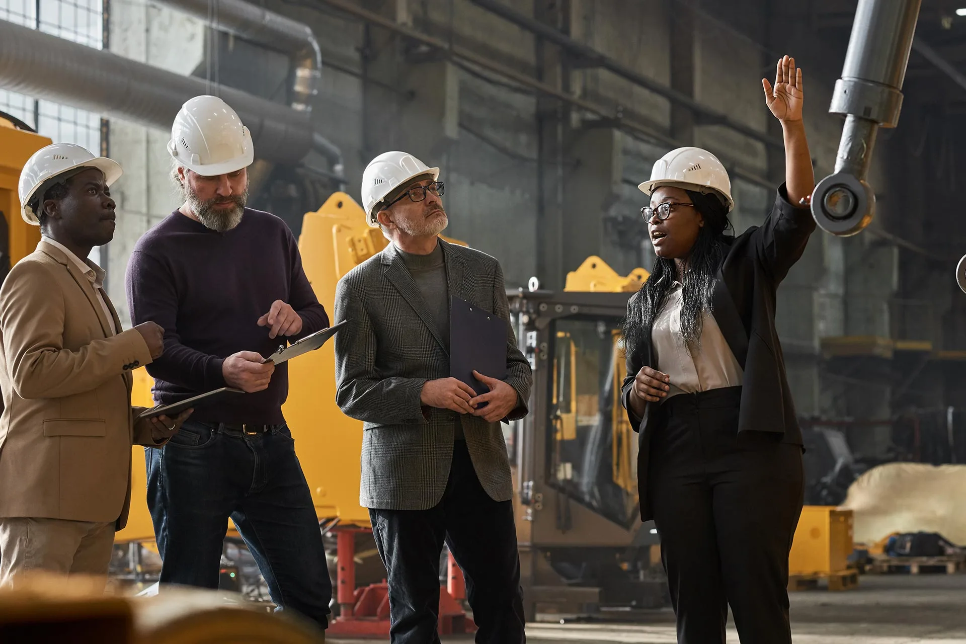 businesswoman-presenting-the-equipment-to-colleagu-2022-03-29-23-49-26-utc-jpg